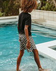 Seaesta Surf x Peanuts® Boys Boardshorts – Scallop Retro Flare in Black & White Checker - Strand