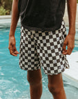 Seaesta Surf x Peanuts® Boys Boardshorts – Scallop Retro Flare in Black & White Checker - Strand